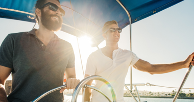 Two friends riding the boat in Thasos